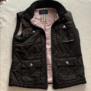 Burberry quilted black vest lined with pink plaid